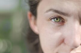 Closeup of a woman's green eye