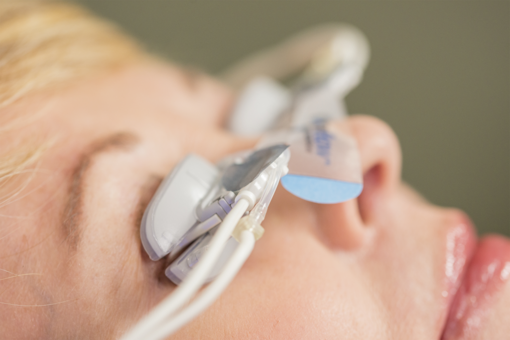 Woman receiving LipiFlow treatment