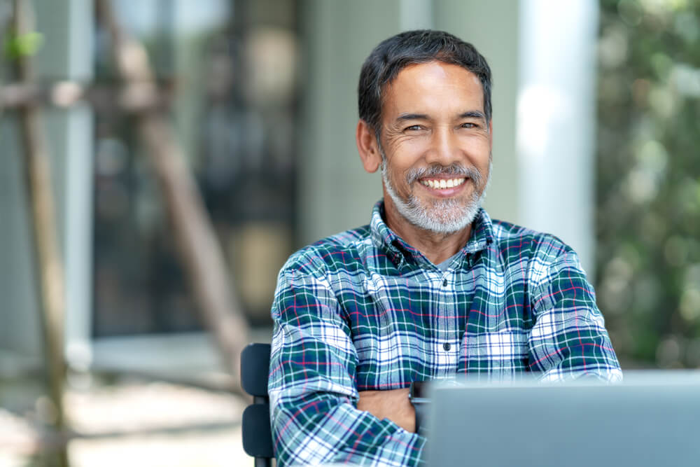 middle-aged man at laptop